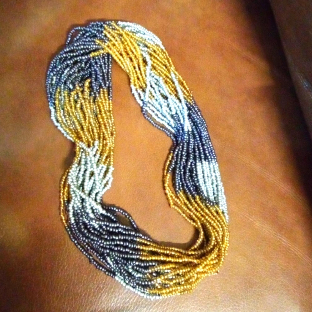 Long vintage beaded multiple strand necklace.